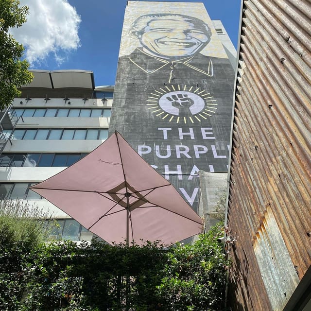 Loco Tequila Bar outdoor seating with street mural, perfect for networking events in Braamfontein.