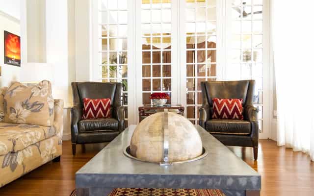Stylish Board Room at Hemingways Nairobi, ideal for meetings & networking with natural light.