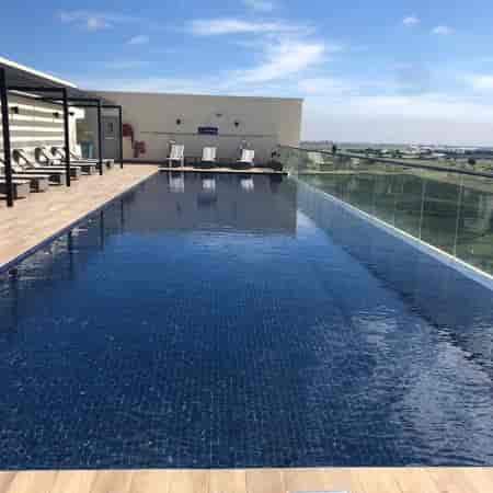 Rooftop infinity pool at Hilton Garden Inn Nairobi Airport for upscale events and relaxation.
