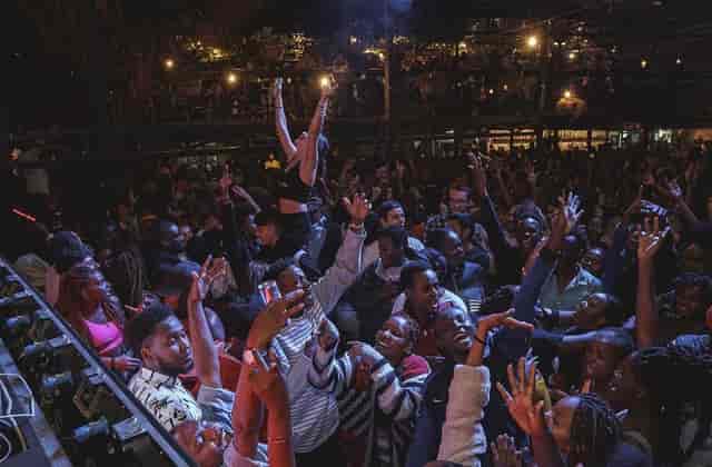 Vibrant crowd enjoying energetic performance at The Alchemist, Nairobi event.