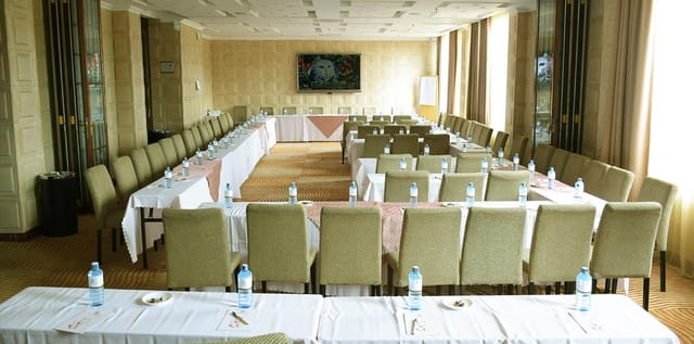 Chestnut Room theater-style setup for meetings at The White Rhino Hotel, bright and inviting.