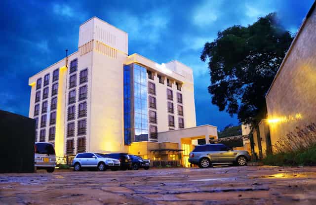 Silk Oak hotel exterior at night, perfect for conferences and events.