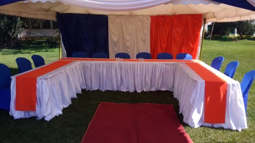 Neatly arranged tent meeting space at KARLO Ground for corporate events.
