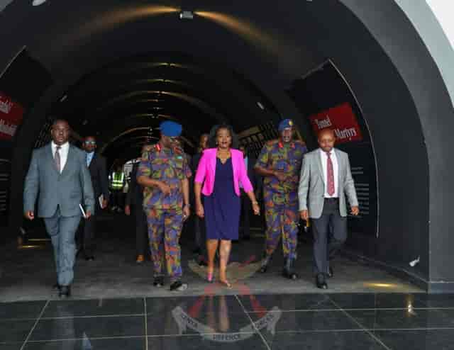 Tunnel of Martyrs, formal event with security personnel and networking focus.