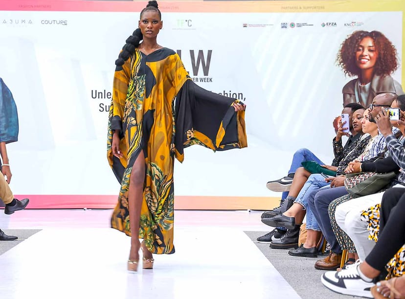 "Model in vibrant design at Nairobi Fashion Week networking event."