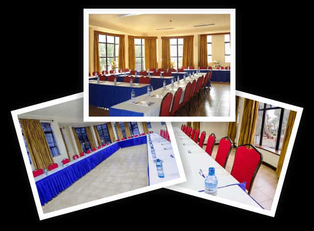 Conference Hall 3 at CHAK Guest House with red chairs and natural light for meetings.