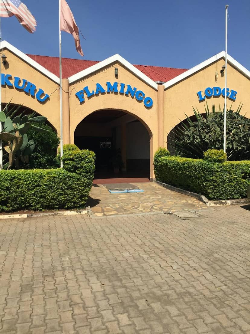 Lake Nakuru Flamingo Resort entrance with lush landscaping for outdoor events and gatherings.