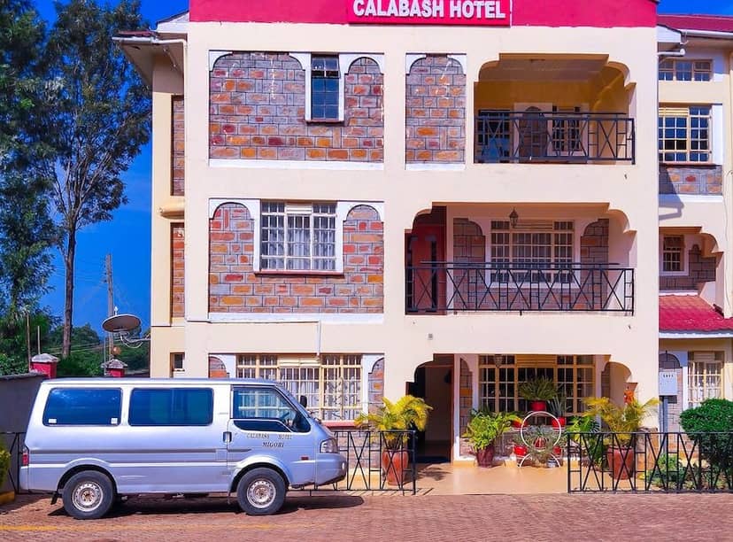 "Calabash Hotel meeting rooms with rustic charm, ideal for workshops and gatherings."