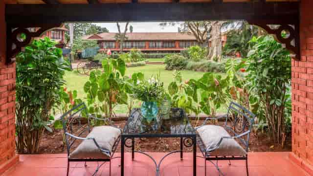 Tinga Tinga Gardens at Fairmont The Norfolk: serene outdoor meeting space with lush greenery.