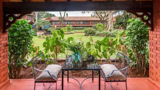 Tinga Tinga Gardens at Fairmont The Norfolk: serene outdoor meeting space with lush greenery.