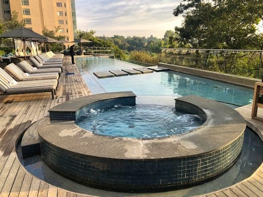 Sleek infinity pool at The Capital On the Park, ideal for summer events and gatherings.