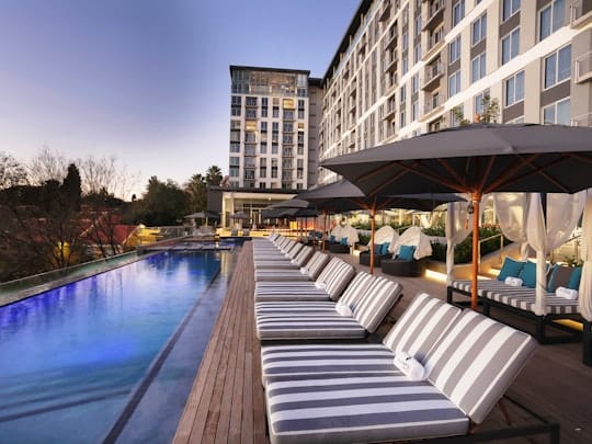 Luxurious poolside setting at The Pod, ideal for outdoor events and gatherings.