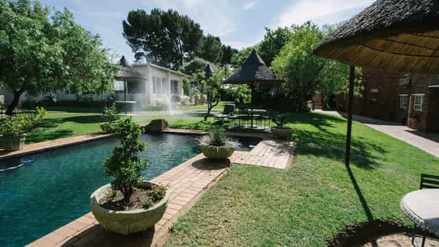 Outdoor venue in Kalahari, CedarWoods: lush landscaping for corporate retreats and events.