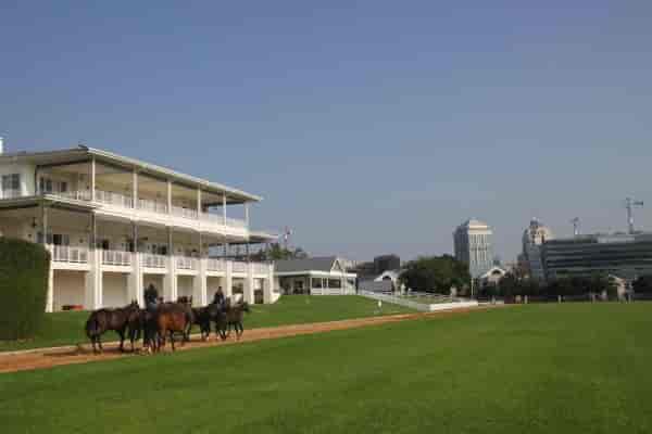 Inanda Club outdoor venue with green lawn, ideal for equestrian events and corporate gatherings.
