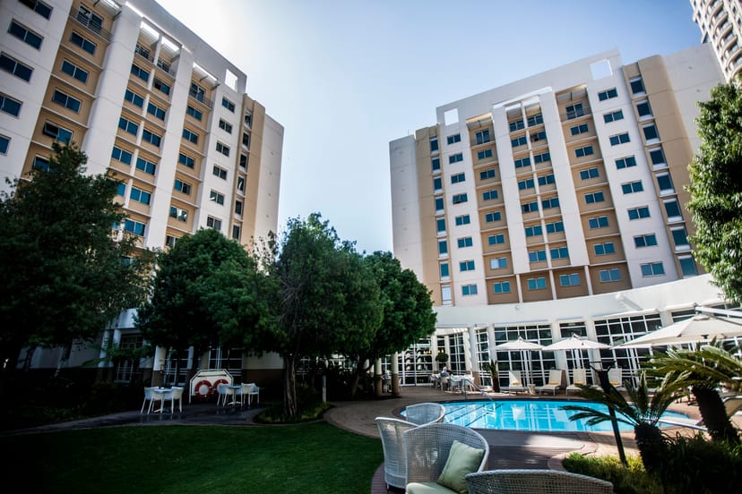 Sophiatown outdoor event space with pool, ideal for conferences and social gatherings.