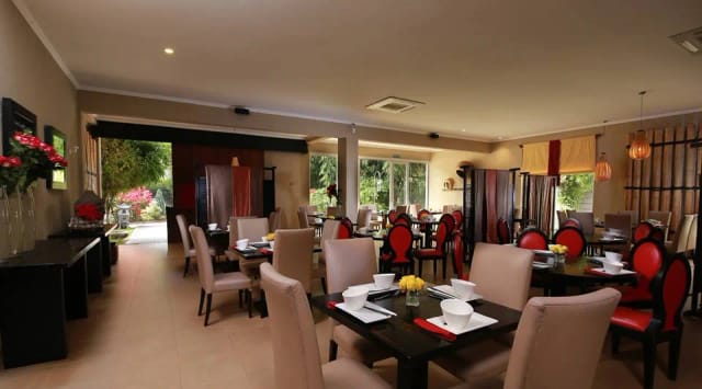 Elegant indoor dining hall in Zen Garden, perfect for meetings and events.