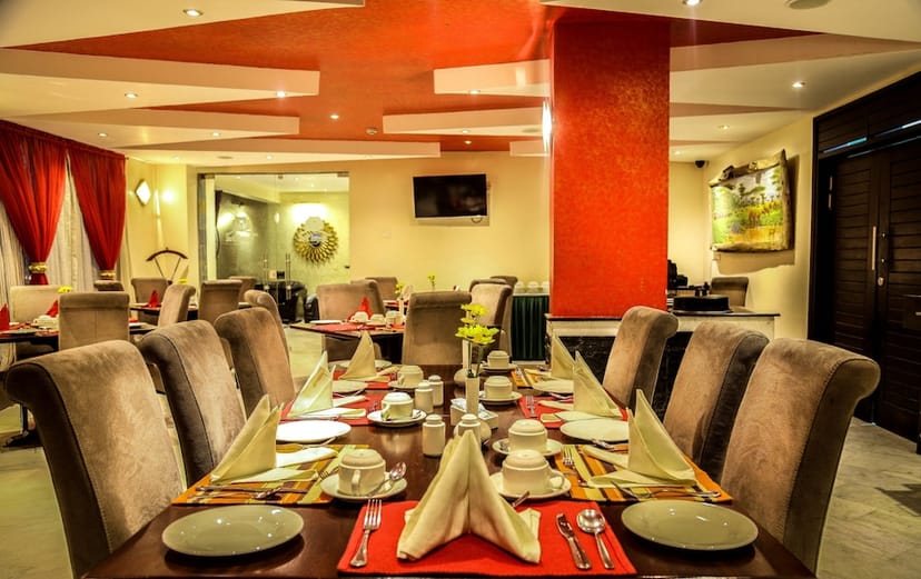 Elegant dining space at The Monarch Hotel for business meetings and events.