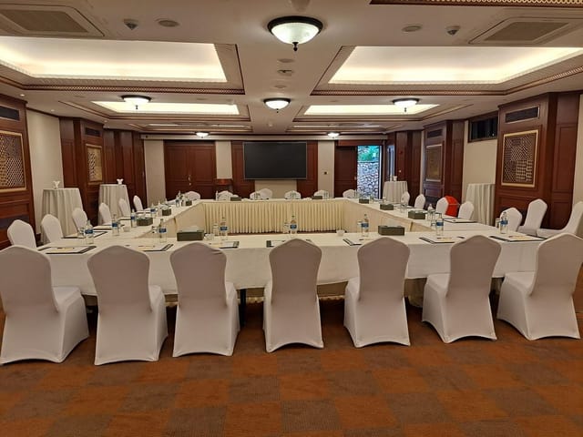 Nairobi Club conference room with oval table, ideal for business meetings and presentations.