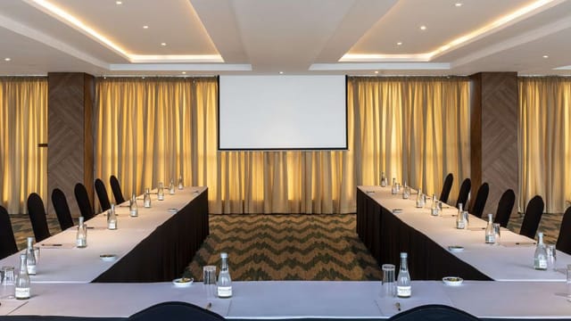 "Nairobi Club conference room with U-shaped table, ideal for corporate events"
