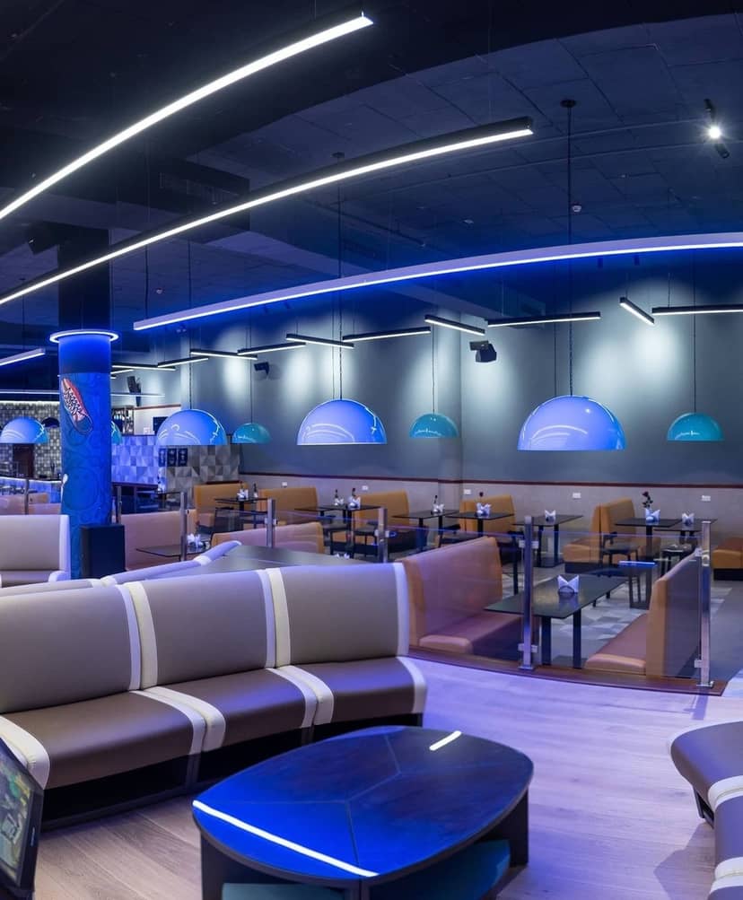 Strikez Restaurant in Westgate Mall: modern venue with blue accents for casual events.