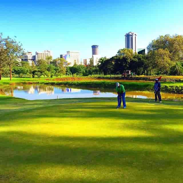 Kenya Railway Golf Club clubhouse with lush greenery, ideal for corporate events and meetings.