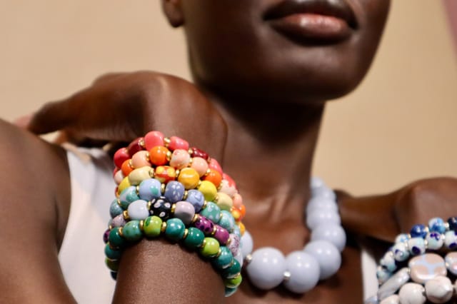 Vibrant handcrafted bracelets at Kazuri Bead Bar for unique event styling.