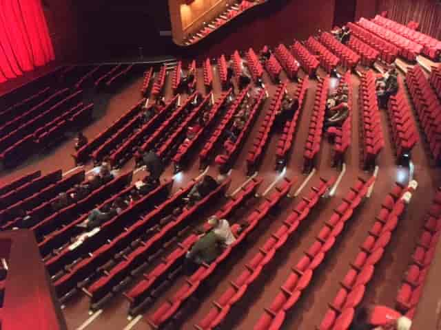 Nelson Mandela Theatre auditorium with red seating, ideal for events and presentations.