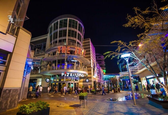 Vibrant outdoor event venue with modern architecture at The Zone @ Rosebank.