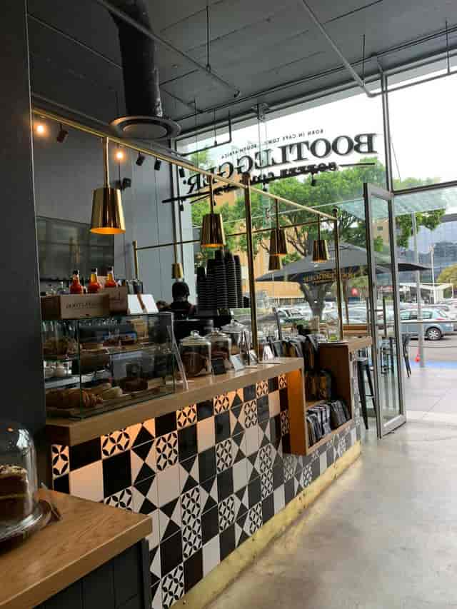 Modern café setup in The Zone @ Rosebank, perfect for networking events and casual gatherings.