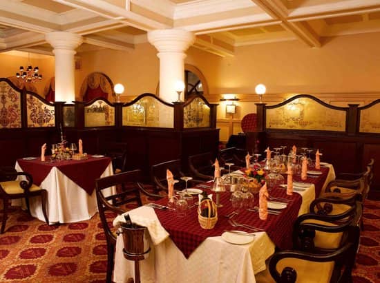 Elegant dining space in The Booth, perfect for intimate gatherings and formal events.