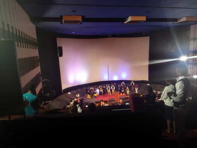 Auditorium at Nairobi Film Centre with curved screen, ideal for events and conferences.