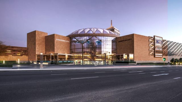 Modern exhibition venue at Sandton Convention Centre with glass architecture for conferences.