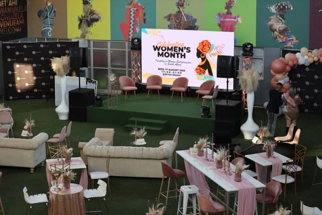 Atrium at 22 On Sloane, elegant Women's Month event space with vibrant decor and seating.