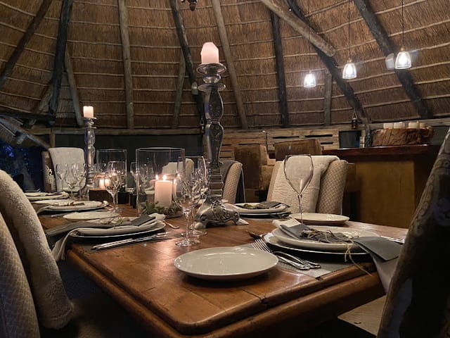 Rustic dining table at The Deck and Bar, perfect for upscale events and gatherings.
