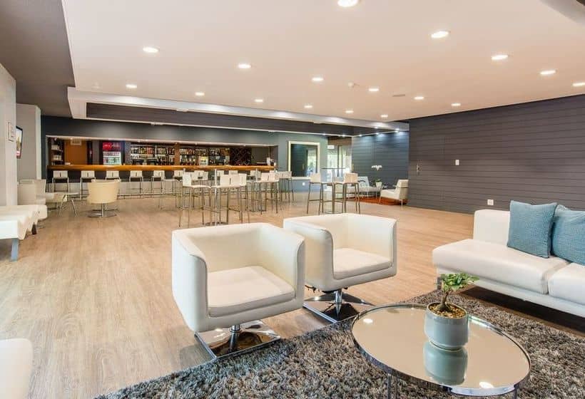 Modern FNB Conference Centre room with stylish seating for meetings and events.