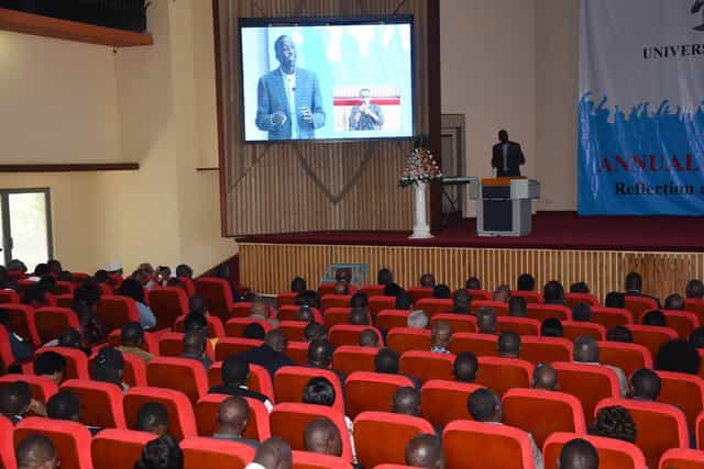 Taifa Hall University of Nairobi: Engaged audience at a professional conference presentation.