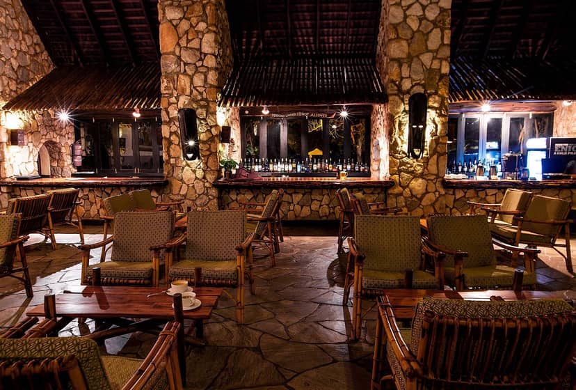 Taita Hills Safari Resort meeting space with rustic stone architecture, perfect for team events.
