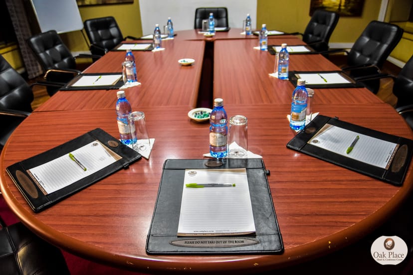 Conference room setup at Oak Place Hotel for professional meetings and corporate events.