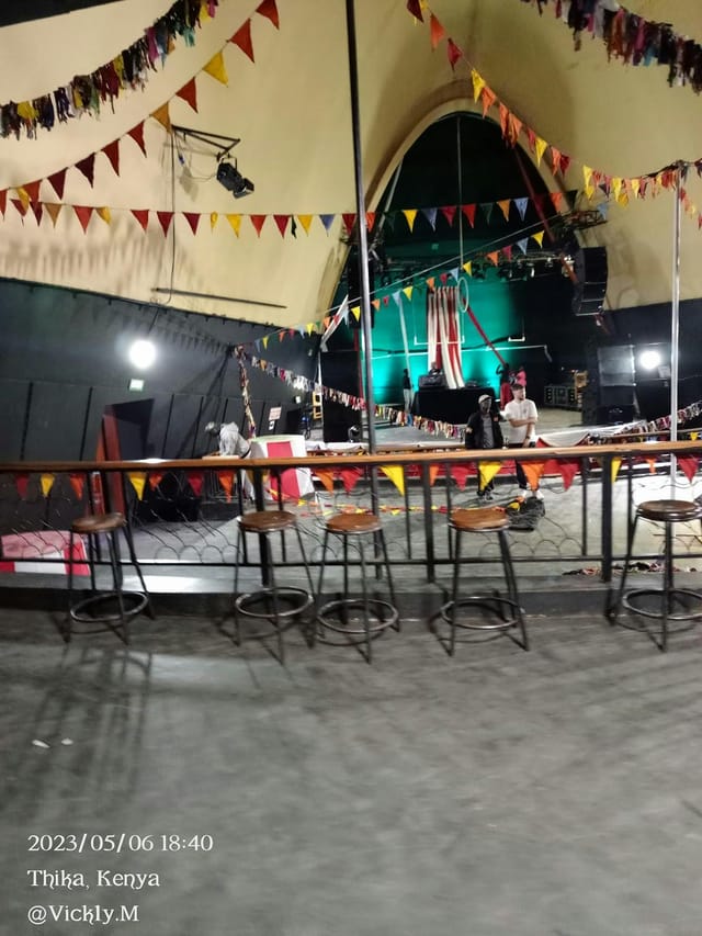 Sarakasi Dome auditorium with colorful stage setup for dynamic events and performances.