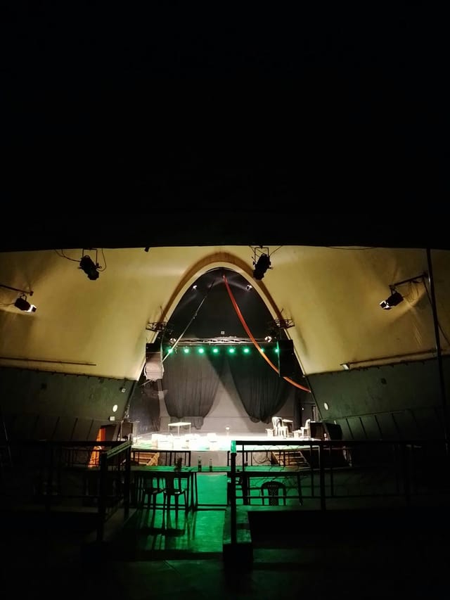 Sarakasi Dome auditorium with arched ceiling, perfect for corporate events and performances.