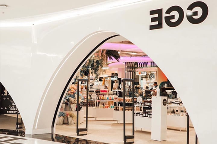 Modern retail space with bold archway for product launches and brand activations.