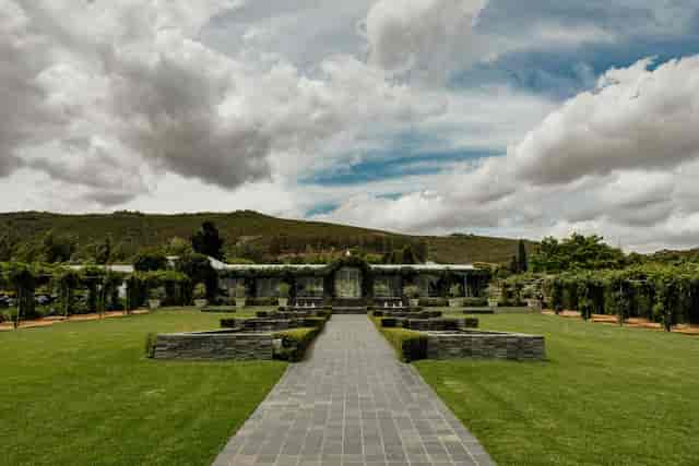 Ivy-Covered Chapel in Belair: a serene wedding venue with lush gardens and stone pathways.