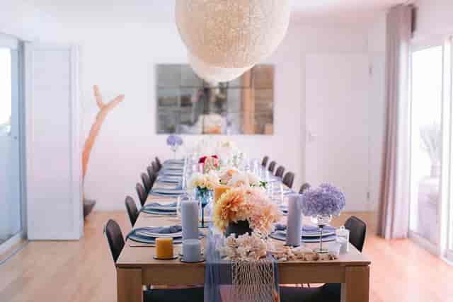 Elegant dining meeting room with floral centerpiece for upscale events and celebrations.