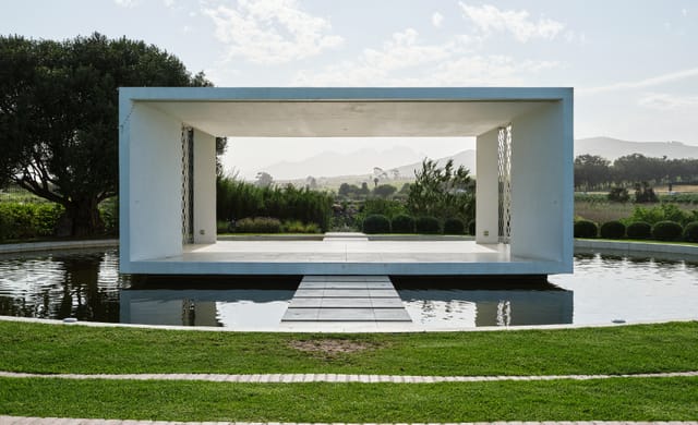 Floating Pavilion at Hazendal: modern venue with lush greenery for weddings & events.