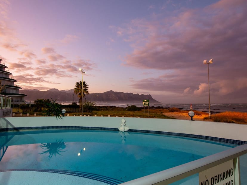 Beachfront conference center with pool, ideal for events and gatherings.