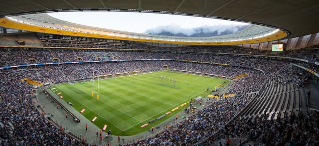 Packed Stadium Bowl in DHL Stadium for corporate events or live performances.