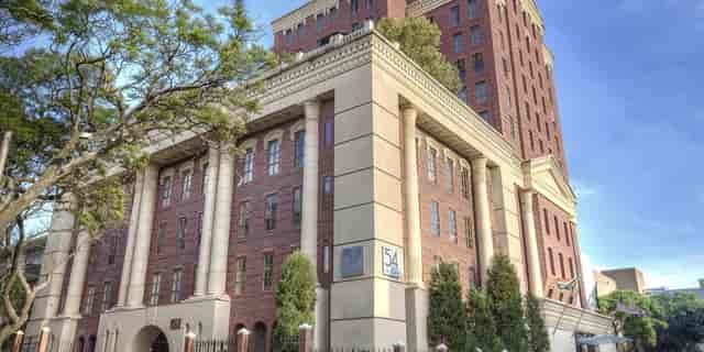 Kentridge Suite at 54 on Bath: Elegant venue with columns for weddings and conferences.