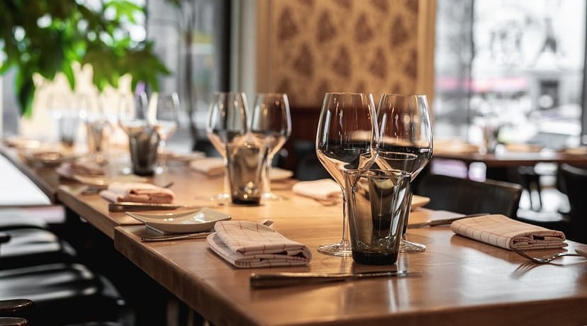 Intimate dining table at Restaurant Kuu, elegant setting for business dinners.