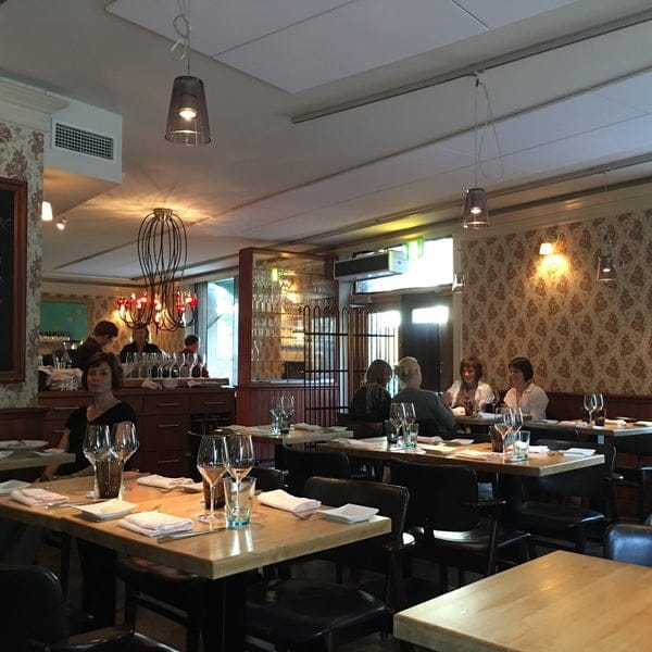 Cozy restaurant terrace in Ravintola Kuu for intimate meetings and private events.