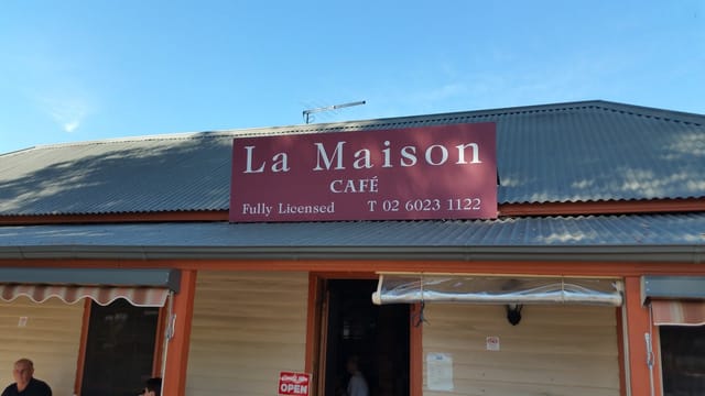 Charming La Maison Café exterior, ideal for casual meetings and small events.